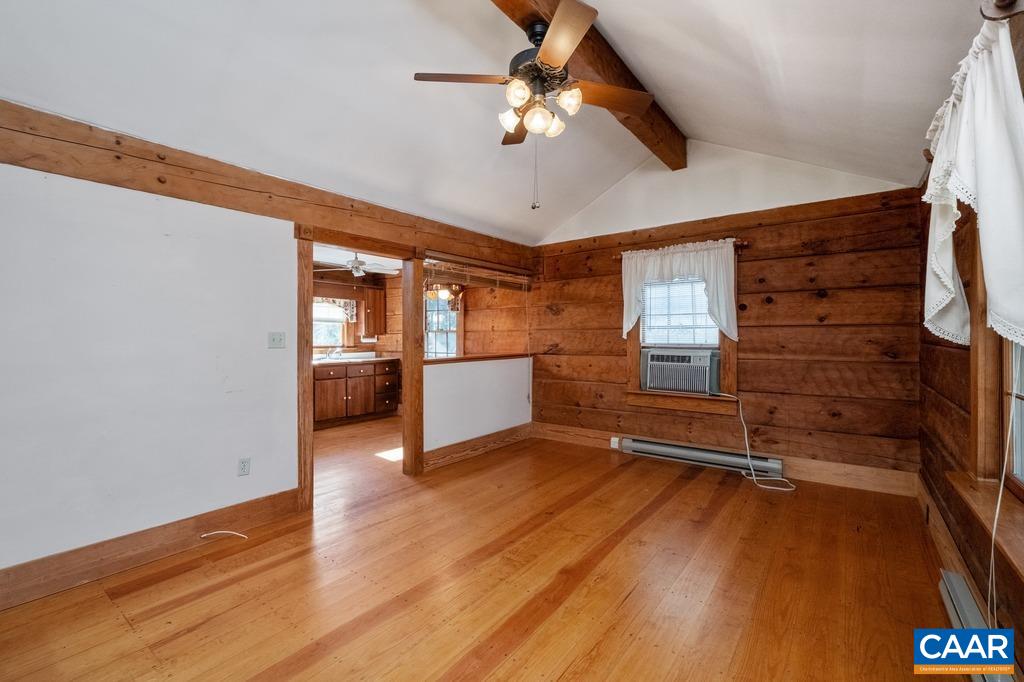 4844 Haden Martin Road Palmyra, VA 22963 - Photo 9 of 40 a view of an empty room with a window and wooden floor