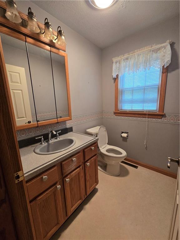 205 Hamburg Road Greenville, PA 16125 - Photo 22 of 39 a bathroom with a double vanity sink and a mirror