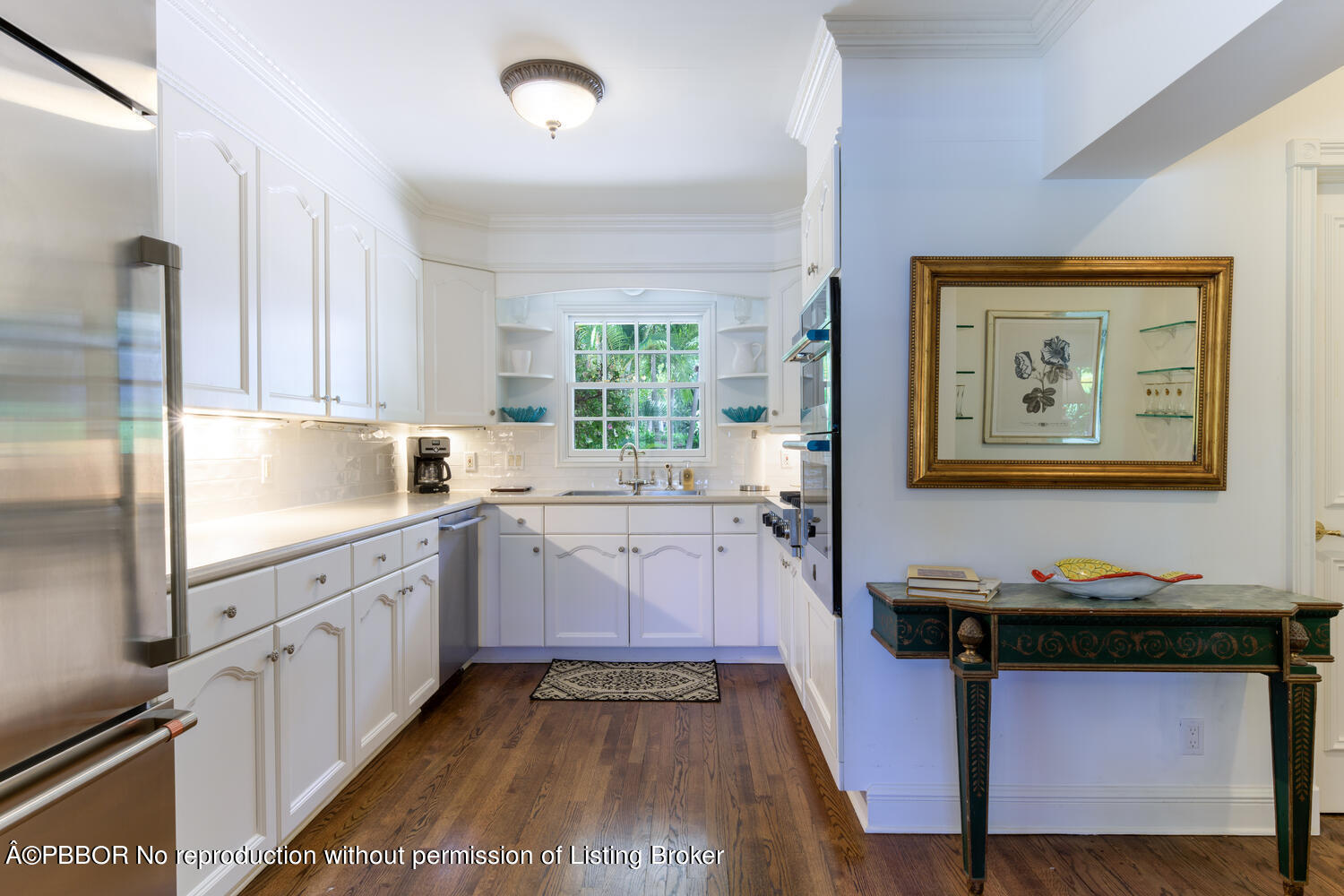 201 Pendleton Avenue Palm Beach, FL 33480 - Photo 6 of 22 a kitchen with sink cabinets and window