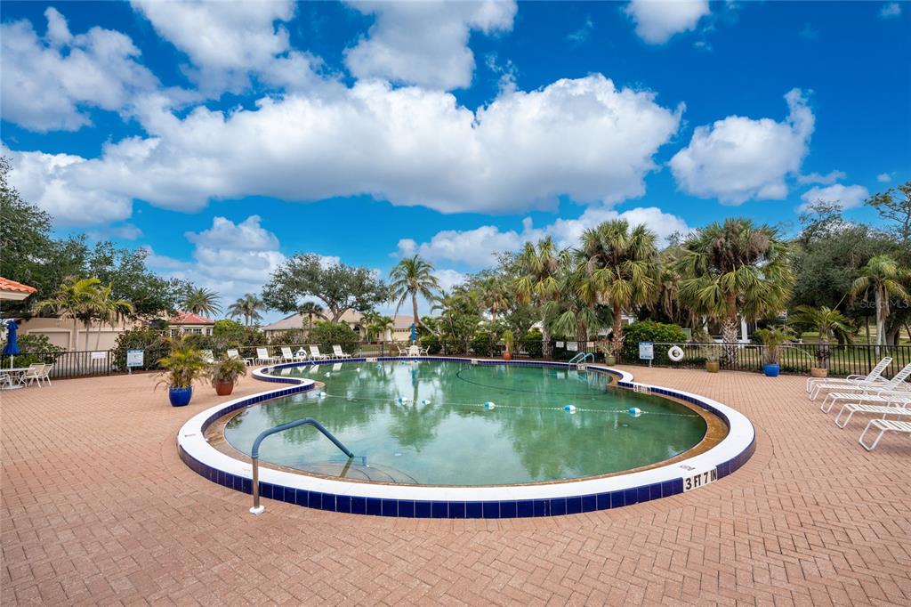 10214 Windsong Road Punta Gorda, FL 33955 - Photo 55 of 68 a view of a swimming pool with sunset