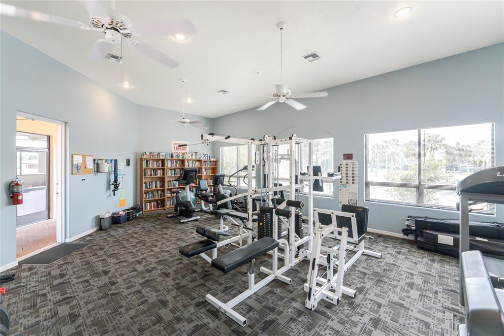 10214 Windsong Road Punta Gorda, FL 33955 - Photo 57 of 68 a view of a livingroom with furniture and a large window
