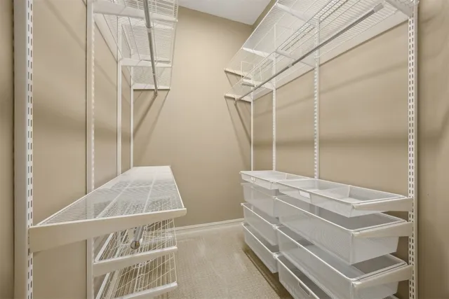 a bathroom with a tub and shower