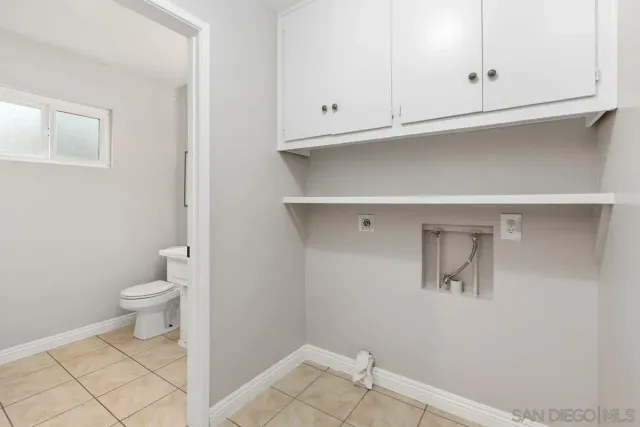a bathroom with a toilet and a sink
