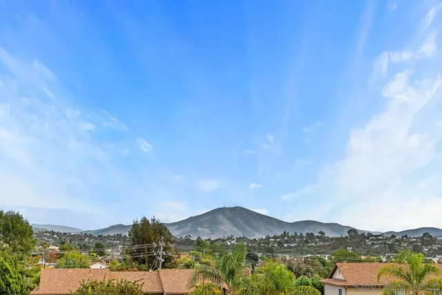 a view of a city with mountain