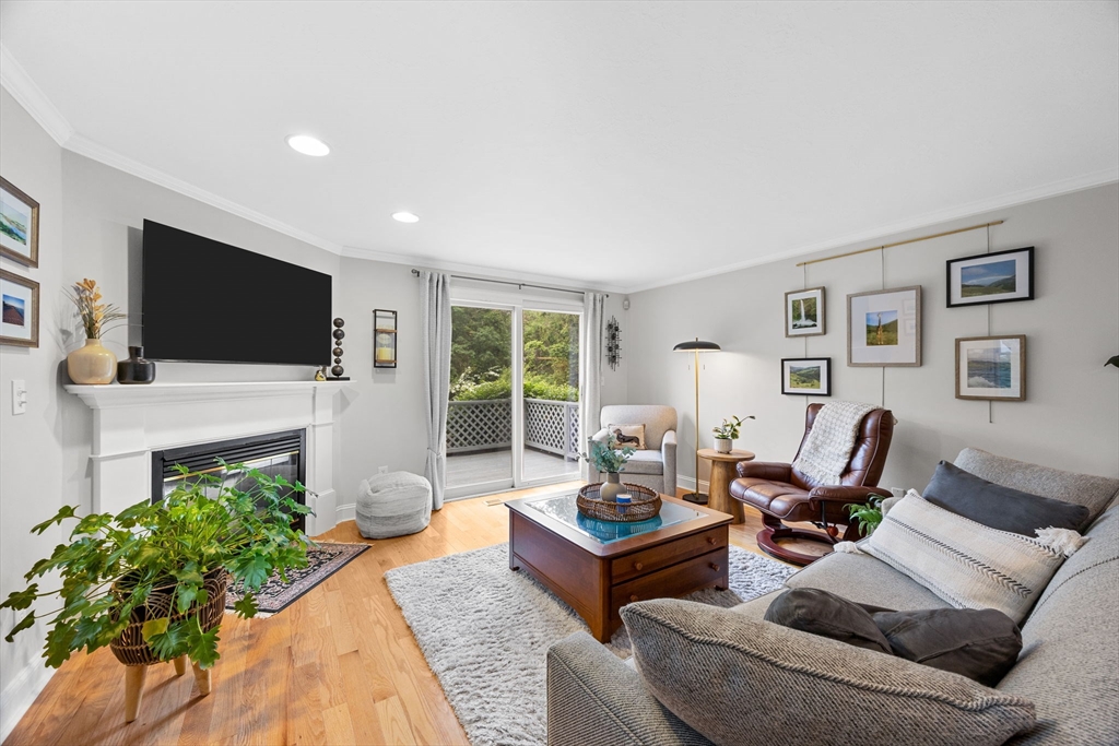 2 Darby Point, Unit 2 Mashpee, MA 02649 - Photo 15 of 42 a living room with furniture and a flat screen tv