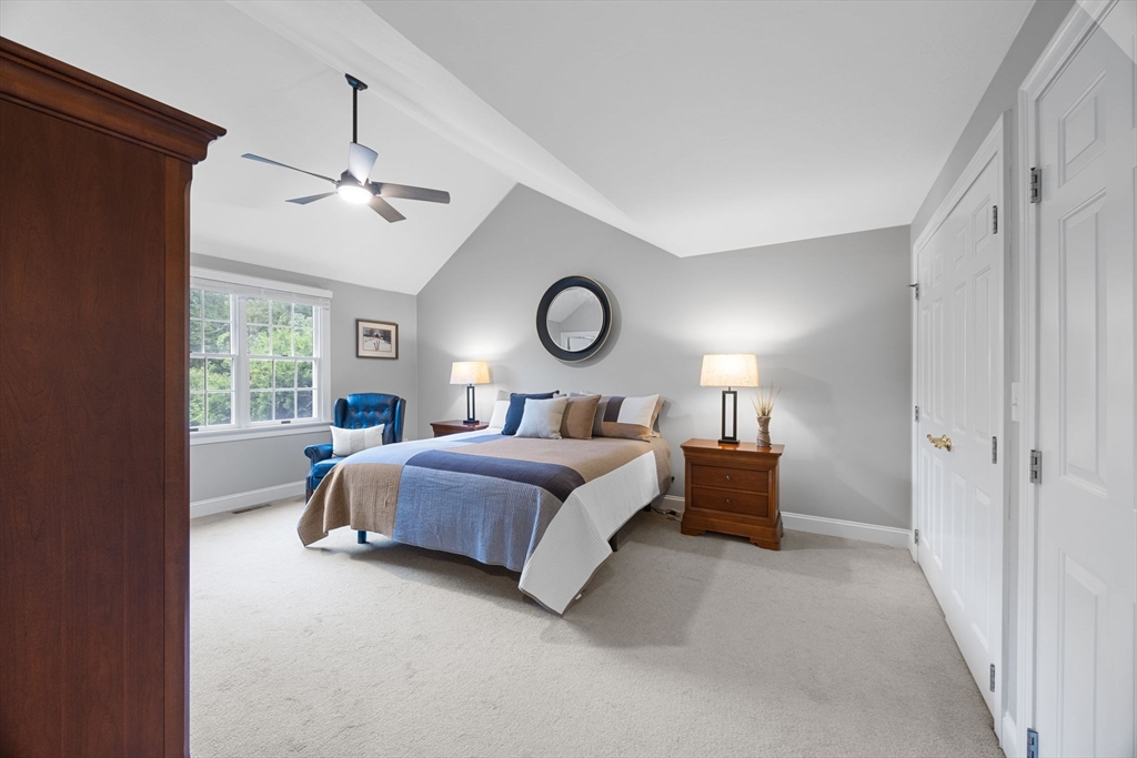 2 Darby Point, Unit 2 Mashpee, MA 02649 - Photo 18 of 42 a bedroom with a bed and window