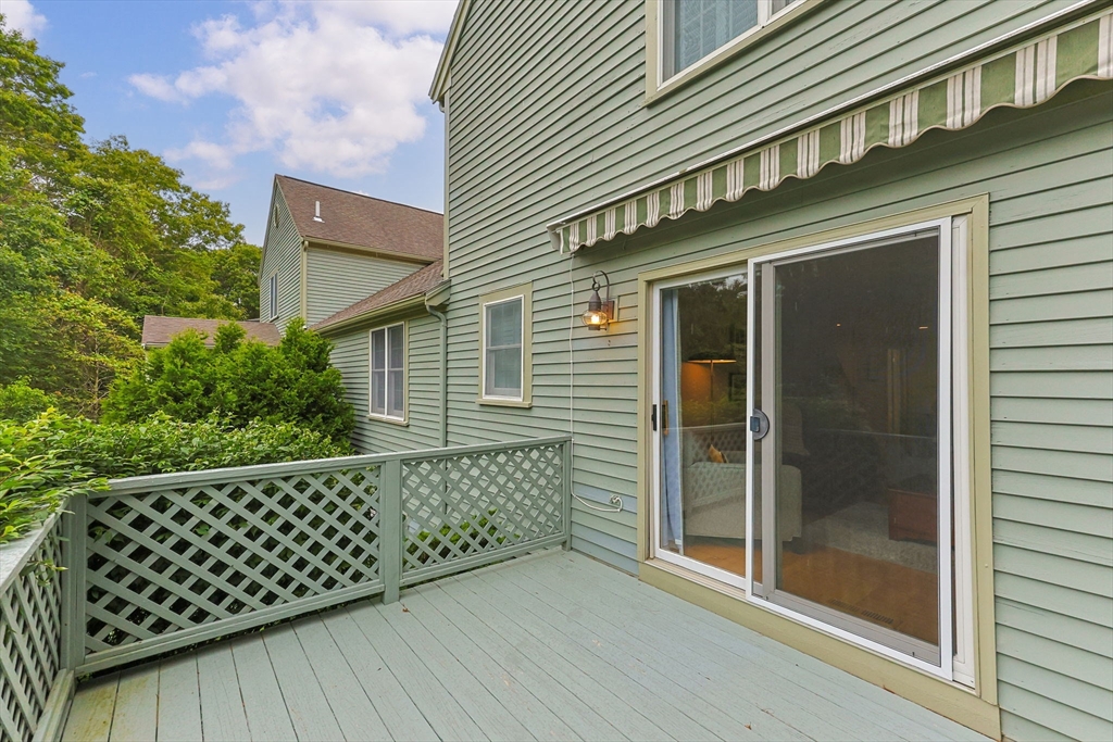 2 Darby Point, Unit 2 Mashpee, MA 02649 - Photo 33 of 42 a front view of a house
