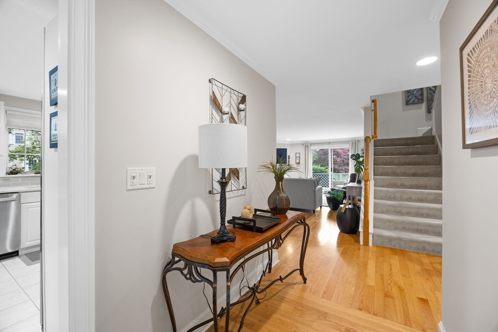 2 Darby Point, Unit 2 Mashpee, MA 02649 - Photo 5 of 42 a living room with furniture and wooden floor