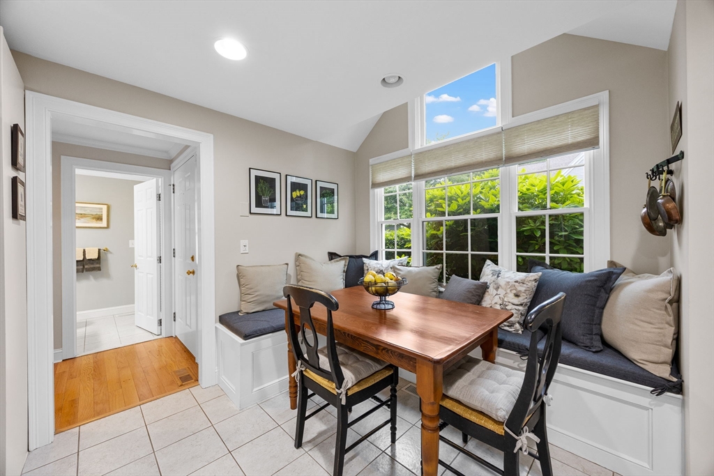 2 Darby Point, Unit 2 Mashpee, MA 02649 - Photo 7 of 42 a view of a dining room with furniture and a large window