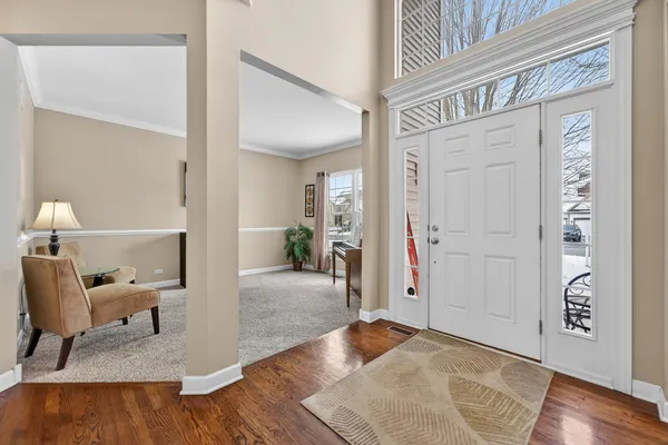a view of a livingroom with furniture and wooden floor