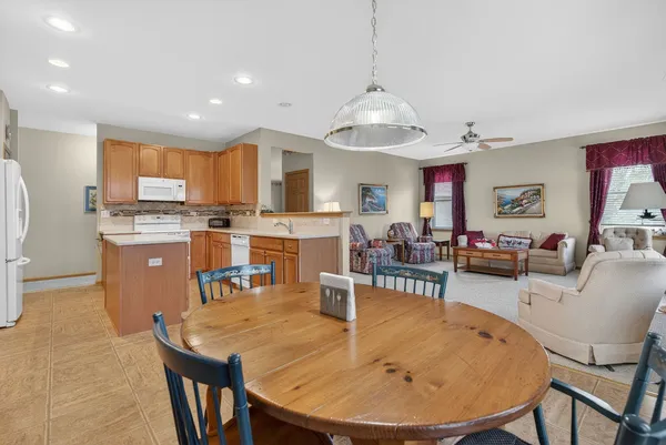 a view of a dining room with furniture
