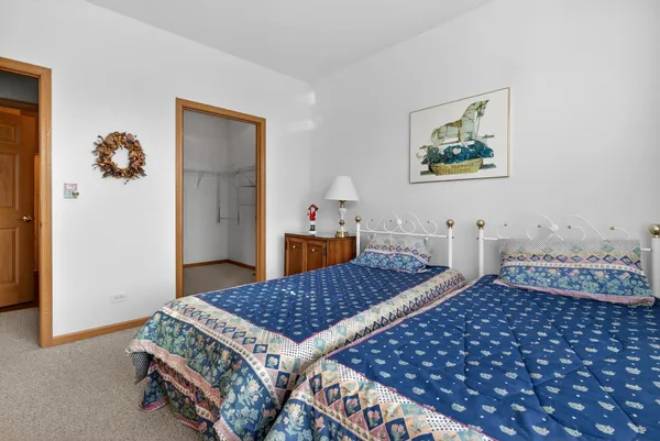a utility room with cabinets washer and dryer