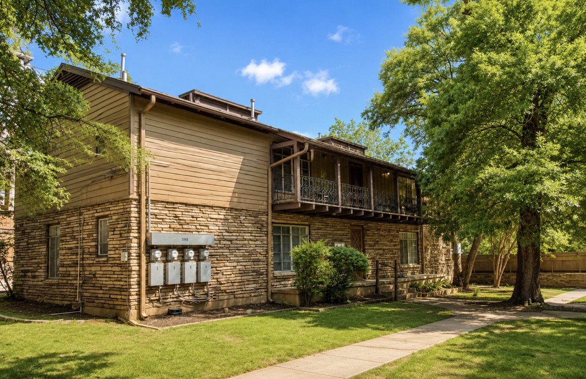 2509 Enfield Road, Unit A Austin, TX 78703 - Photo 1 of 1 Mature trees and a meticulously maintained lawn frame this appealing multi-unit residence with inviting balconies.