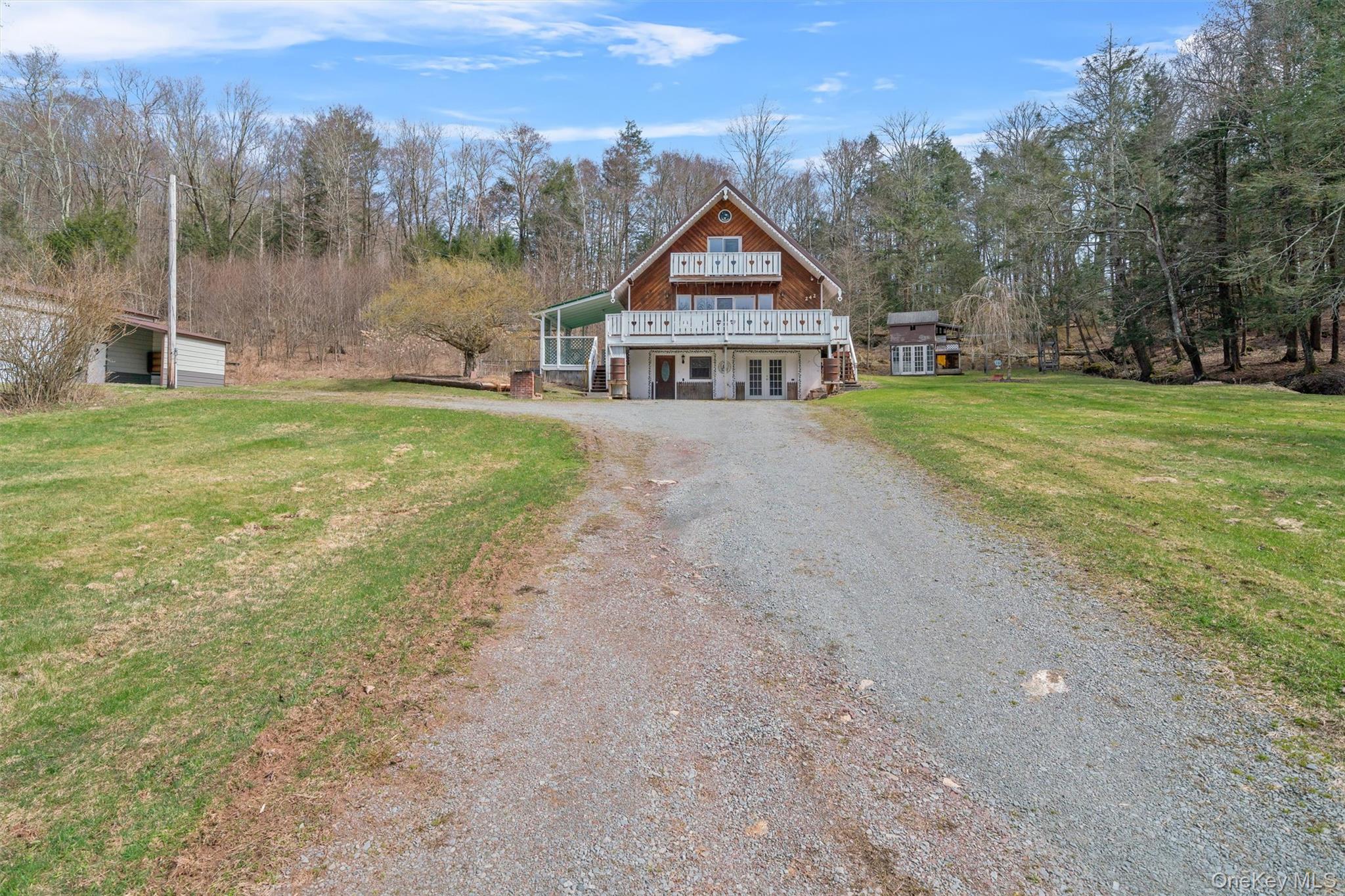 242 Callicoon Center Road Jeffersonville, NY 12748 - Photo 12 of 44 a front view of a house with garden
