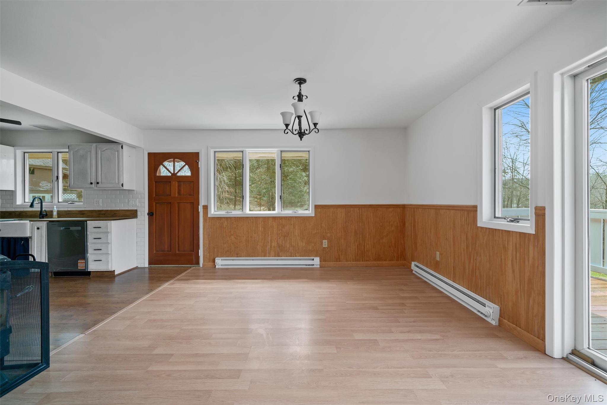 242 Callicoon Center Road Jeffersonville, NY 12748 - Photo 17 of 44 wooden floor in an empty room with a window