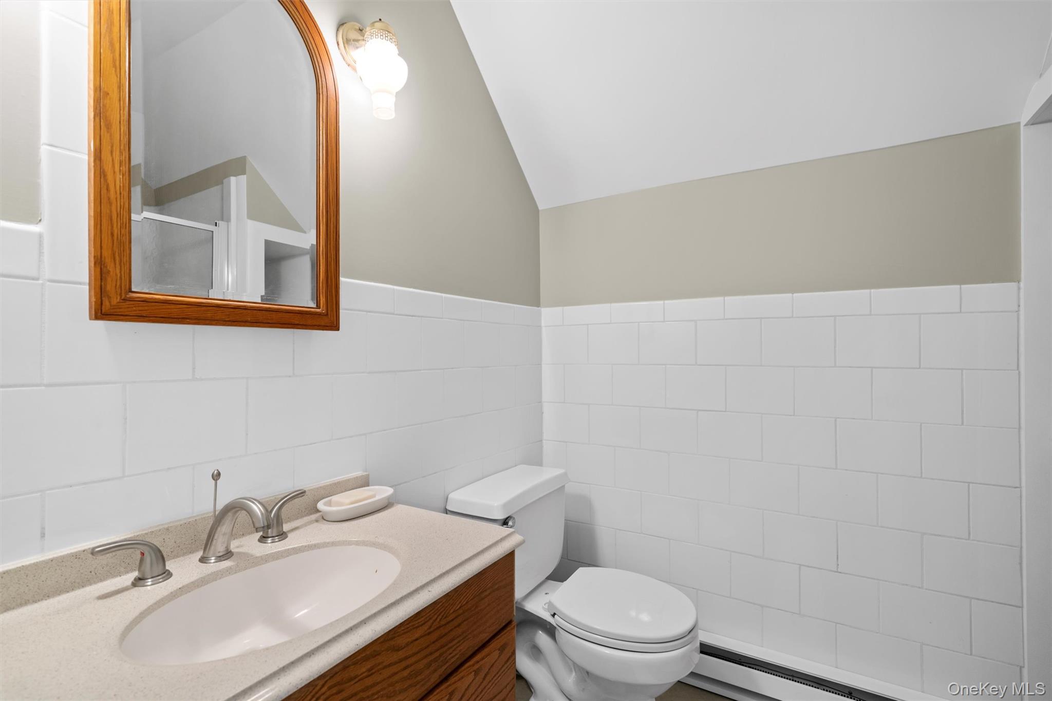 242 Callicoon Center Road Jeffersonville, NY 12748 - Photo 26 of 44 a bathroom with a sink toilet and mirror