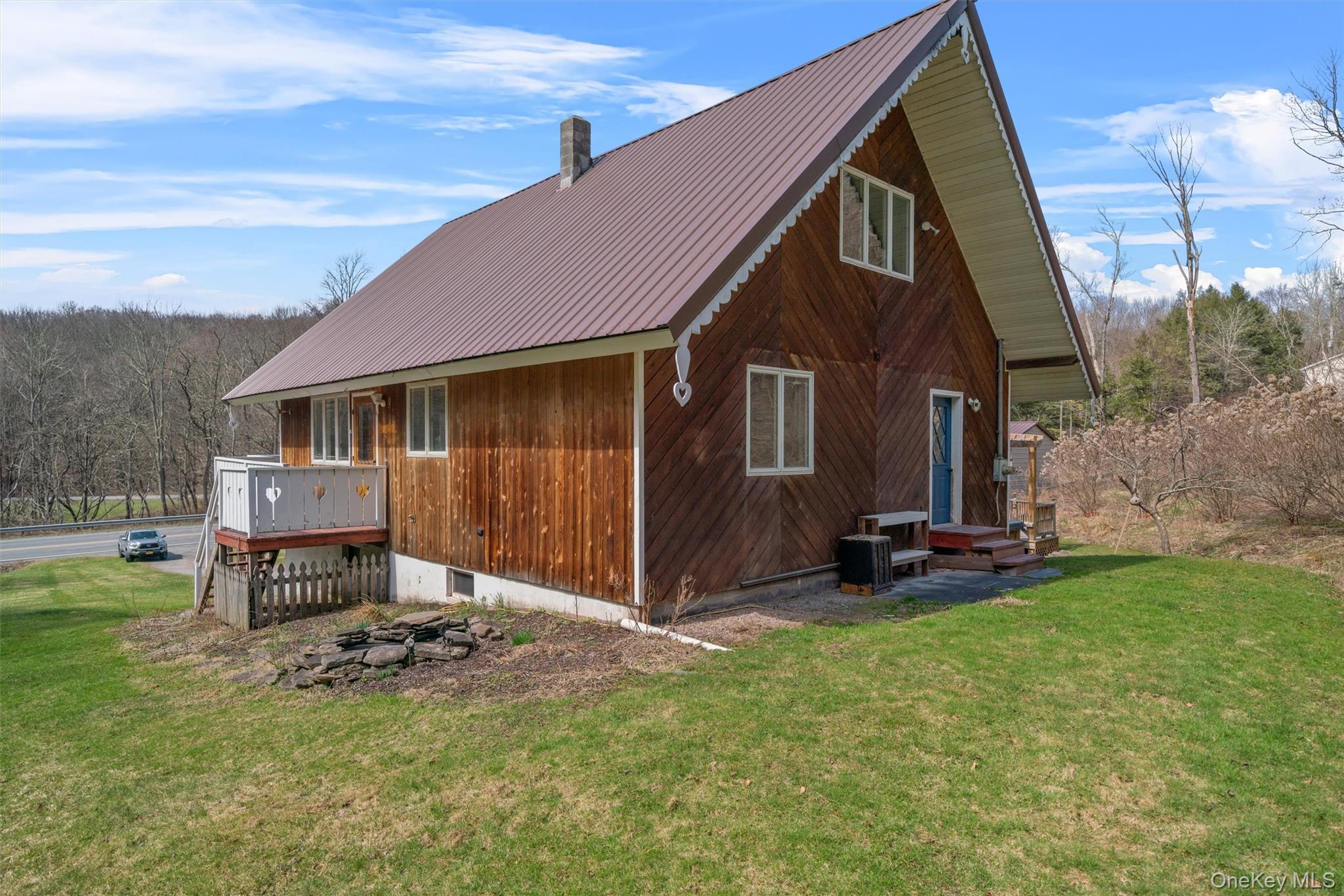 242 Callicoon Center Road Jeffersonville, NY 12748 - Photo 40 of 44 a view of a house with backyard and porch
