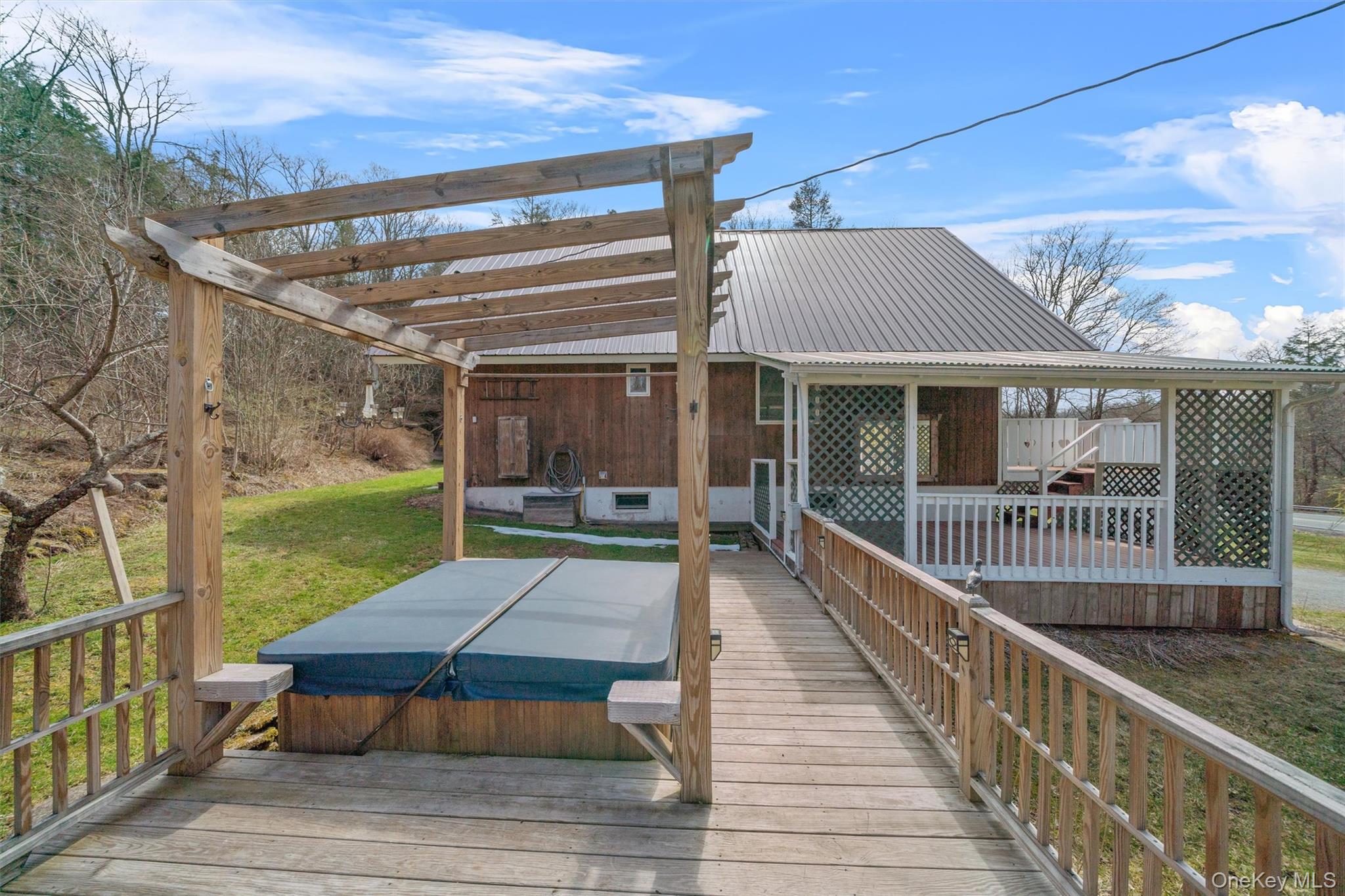 242 Callicoon Center Road Jeffersonville, NY 12748 - Photo 6 of 44 a view of a patio with a table and chairs