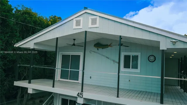a view of a sign board in the garden in a field