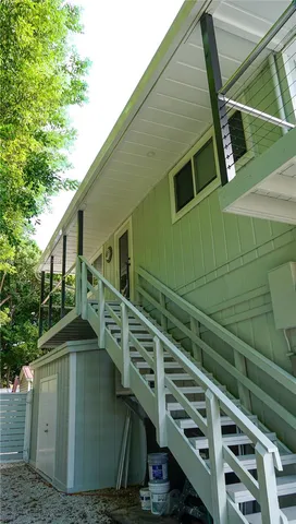 a view of a house with a large window