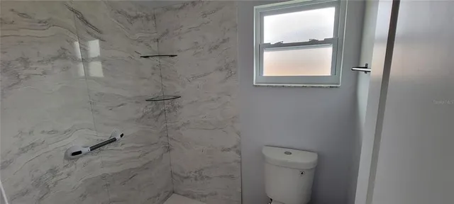 a bathroom with a window