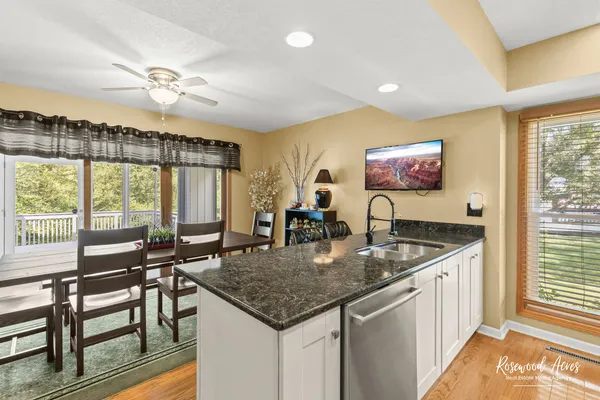 a very nice looking kitchen with a large window