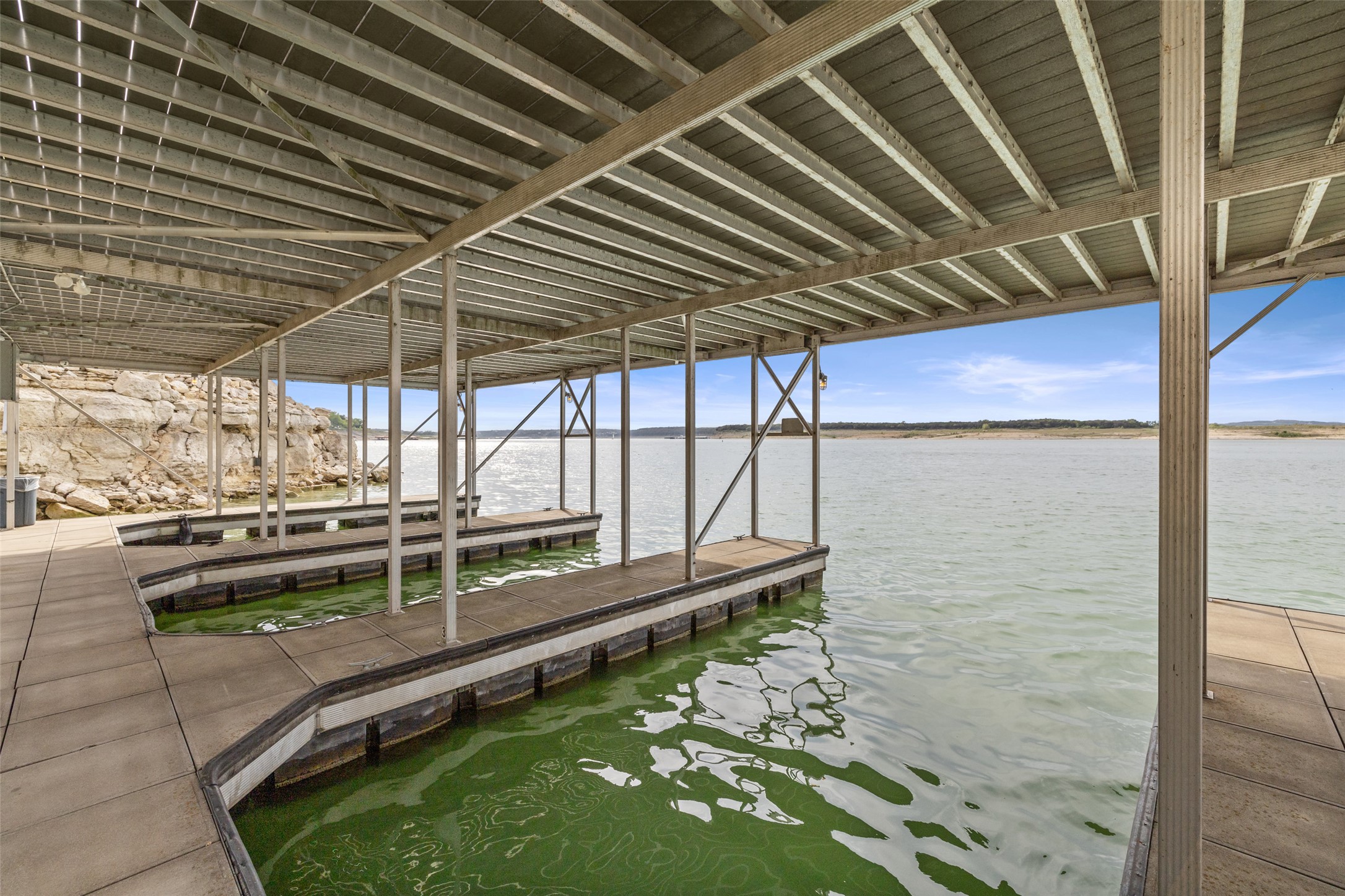 2918 Ranch To Market Road 620, Unit O282 Austin, TX 78734 - Photo 38 of 40 View of dock featuring a water view