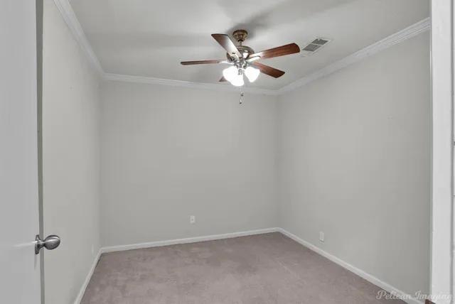 a view of a small space with a fan