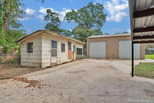 a front view of a house with a garage