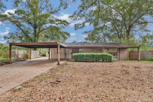 a view of house with outdoor space