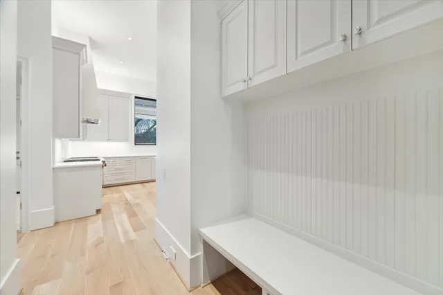 a view of kitchen and wooden floor