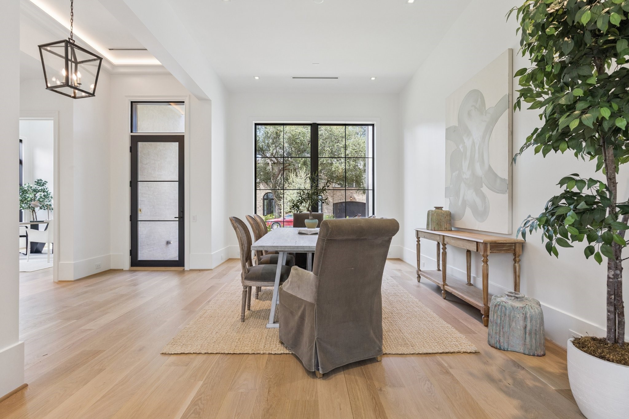 2711 Eastgrove Lane Houston, TX 77027 - Photo 3 of 48 a view of a dining room with furniture window and wooden floor