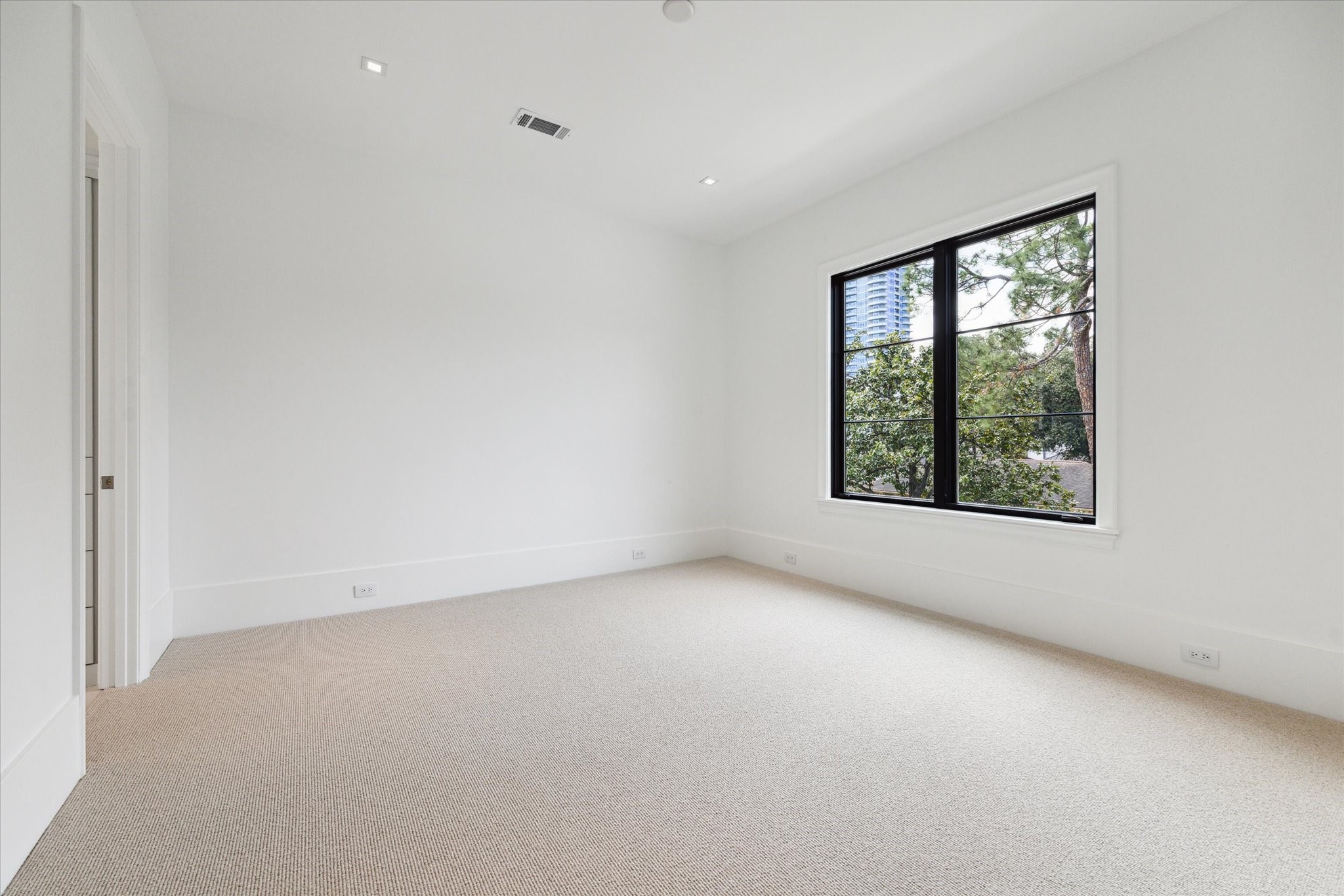 2711 Eastgrove Lane Houston, TX 77027 - Photo 39 of 48 an empty room with windows