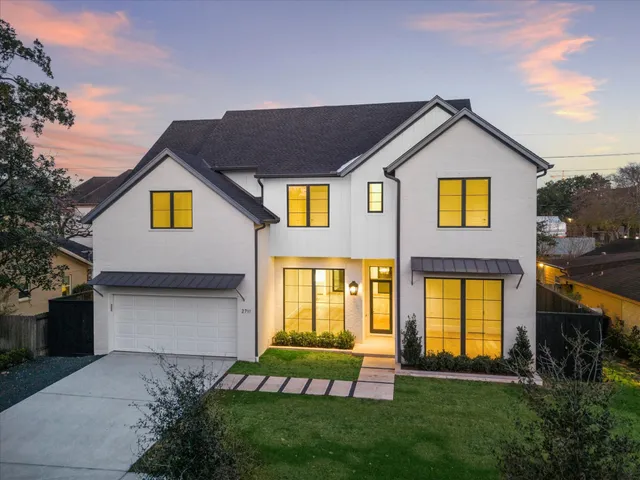 a view of front of house with a yard