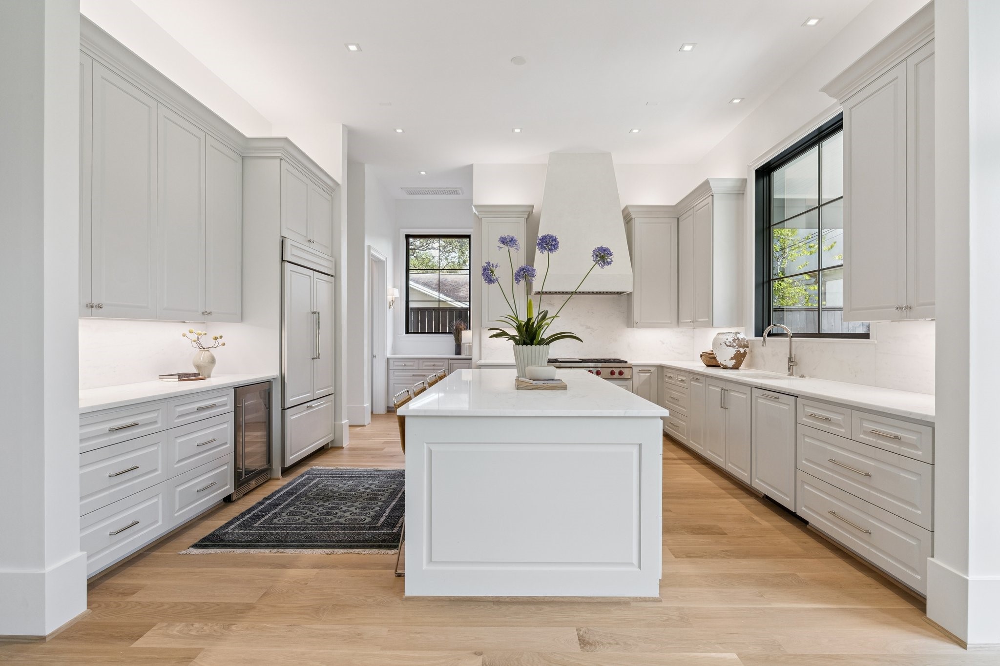 2711 Eastgrove Lane Houston, TX 77027 - Photo 5 of 48 a kitchen with a sink stove and cabinets