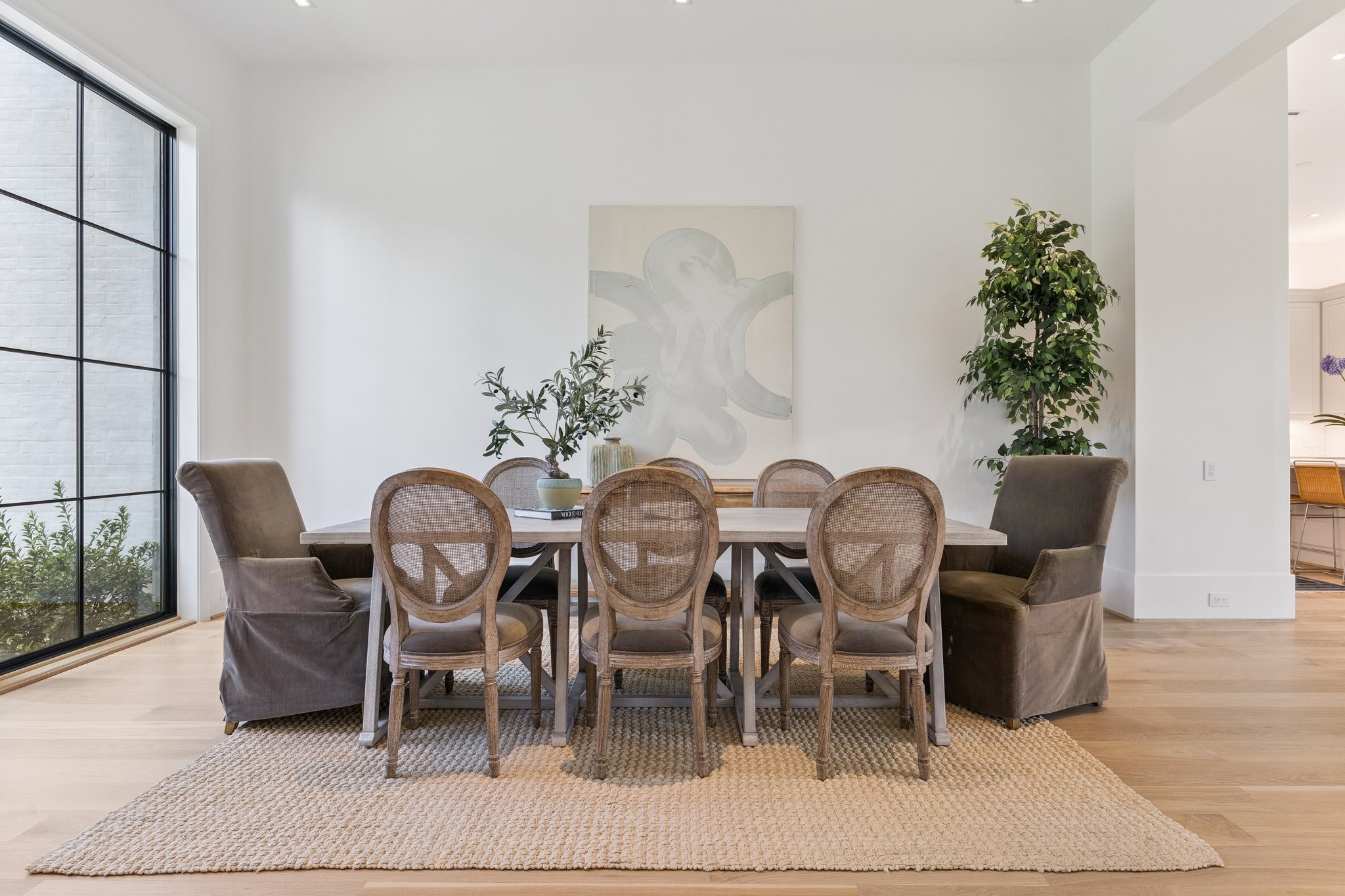 2711 Eastgrove Lane Houston, TX 77027 - Photo 9 of 48 a view of a dining room with furniture and wooden floor