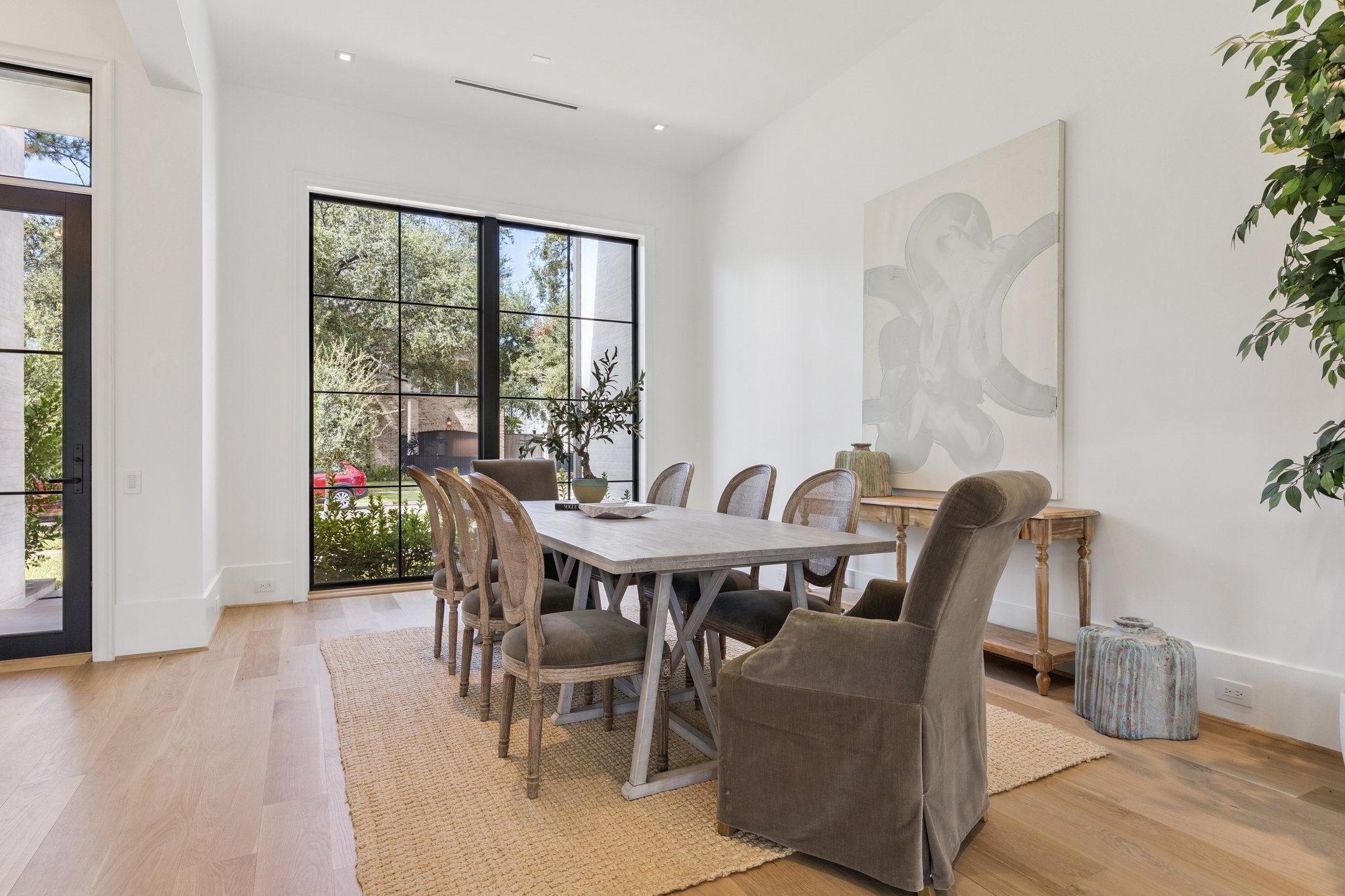 2711 Eastgrove Lane Houston, TX 77027 - Photo 10 of 48 a view of a dining room with furniture and wooden floor