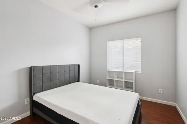 a bathroom with a sink toilet and mirror