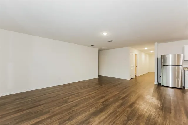 a view of kitchen with wooden floor