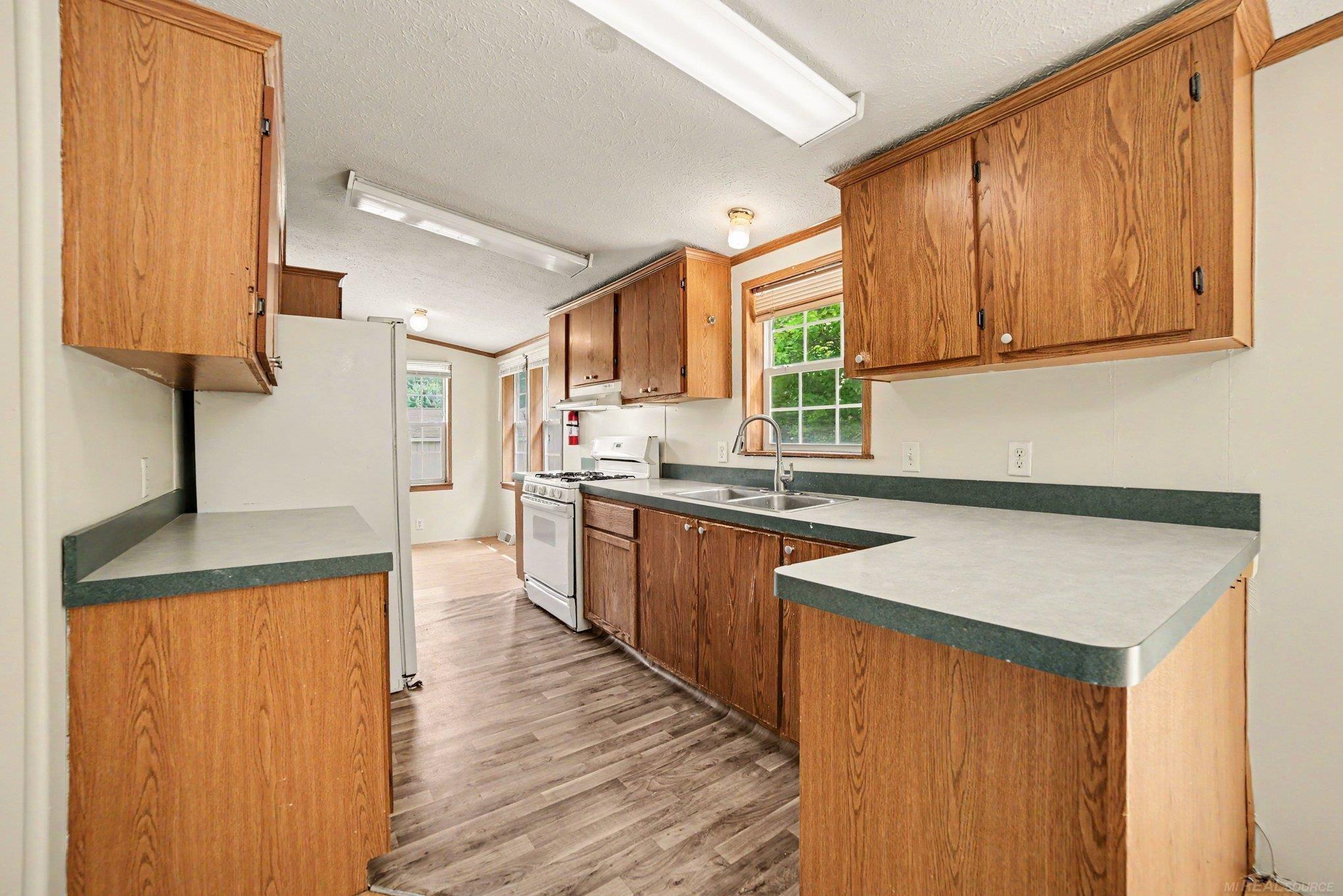 1717 West Townline 16 Road Pinconning, MI 48650 - Photo 8 of 27 50213801-f5a642c9-68a8-4367-a96a-bdbfeff307b5.JPG