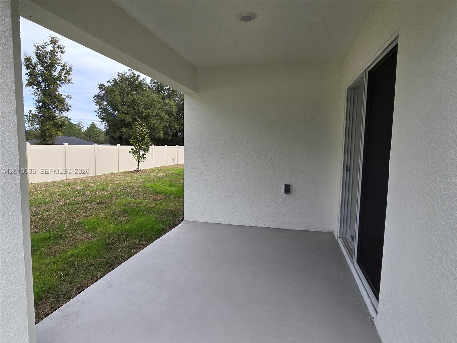 9871 Southeast 161st Lane Road Summerfield, FL 34491 - Photo 31 of 31 a view of backyard with green space