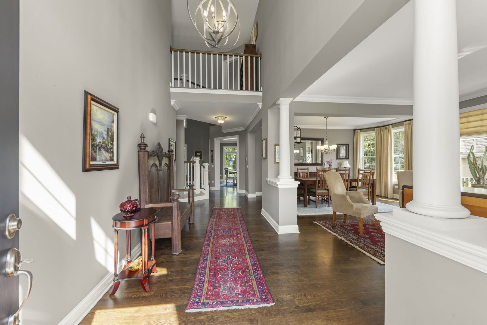 1711 Driving Park Road Wheaton, IL 60187 - Photo 2 of 41 a living room with furniture and a rug