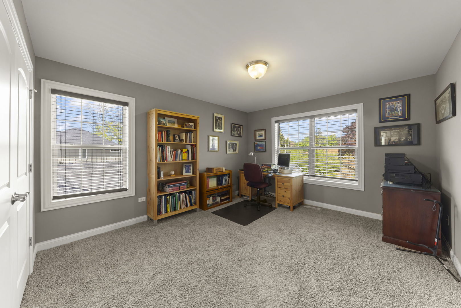 1711 Driving Park Road Wheaton, IL 60187 - Photo 25 of 41 a living room with furniture and a window