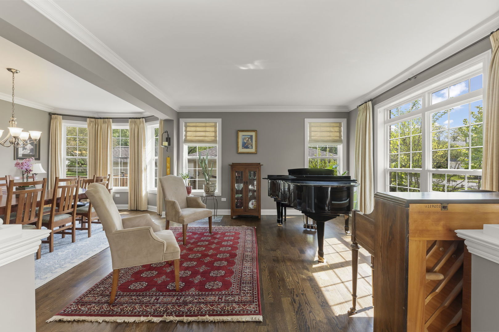 1711 Driving Park Road Wheaton, IL 60187 - Photo 3 of 41 a living room with furniture large windows and wooden floor