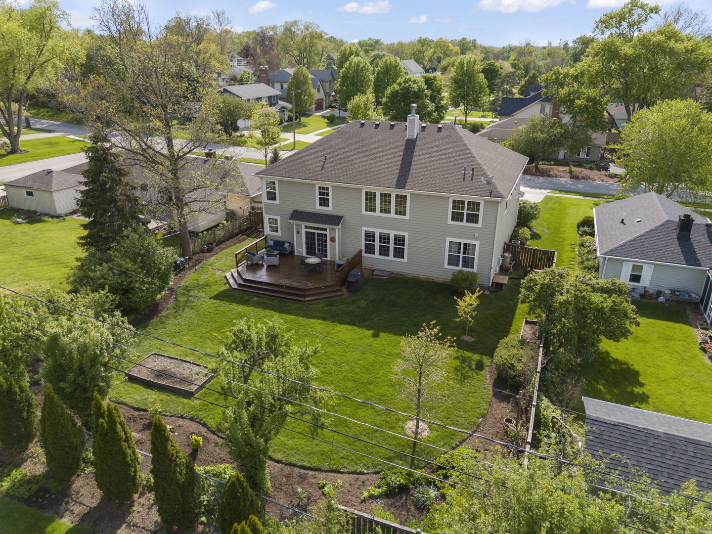 1711 Driving Park Road Wheaton, IL 60187 - Photo 33 of 41 a aerial view of a house with a garden