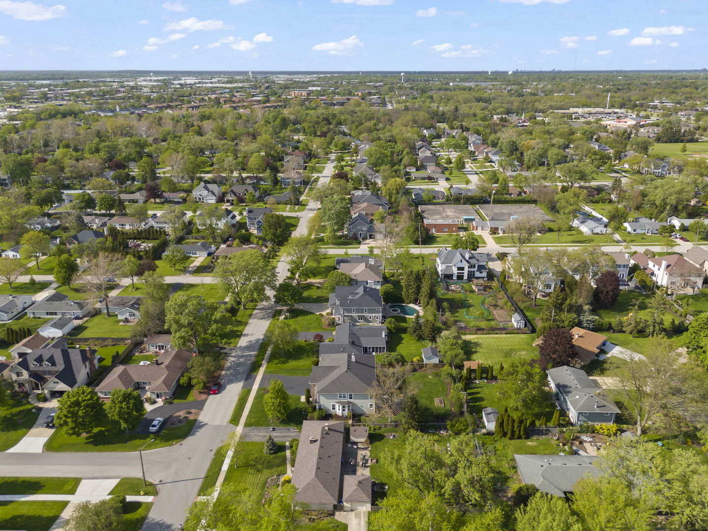 1711 Driving Park Road Wheaton, IL 60187 - Photo 36 of 41 an aerial view of residential houses with outdoor space and trees