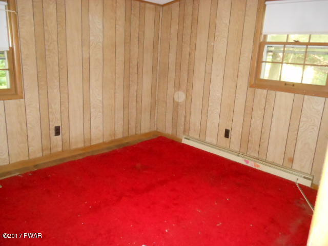 207 Aspen Road Dingmans Ferry, PA 18328 - Photo 14 of 22 a view of livingroom with furniture and window