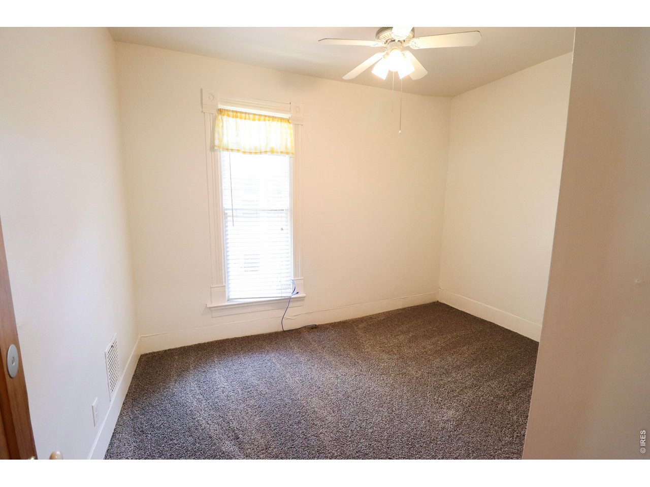 608 South Howes Street Fort Collins, CO 80521 - Photo 25 of 28 a view of empty room with ceiling fan