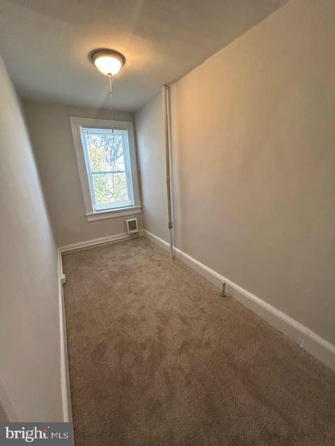 3550 Horton Avenue Baltimore, MD 21225 - Photo 6 of 10 an empty room with windows