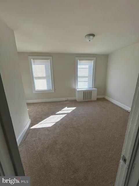 3550 Horton Avenue Baltimore, MD 21225 - Photo 8 of 10 an empty room with windows